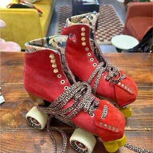 Red Suede Roller Skates with Leopard Print Laces